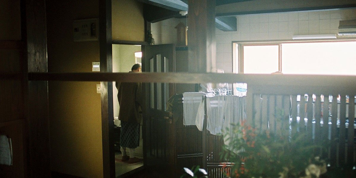 Photo from the movie The Works and Days, of Tayoko Shiojiri in the Shiotani Basin